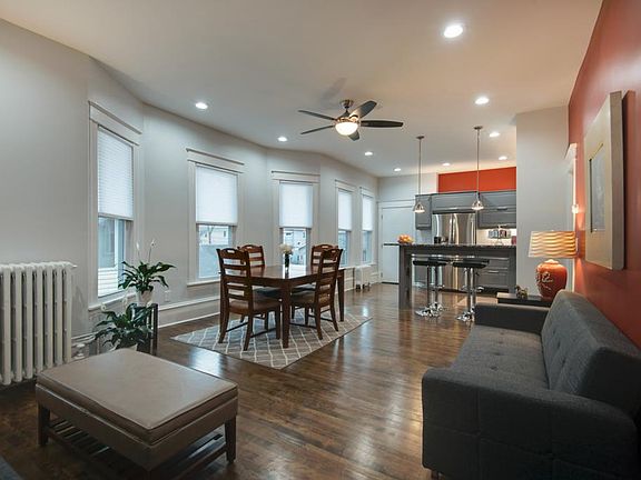 The kitchen, dining and living areas are all connected with an open floor plan.