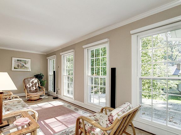 Sunroom with Garden and Terrace Views