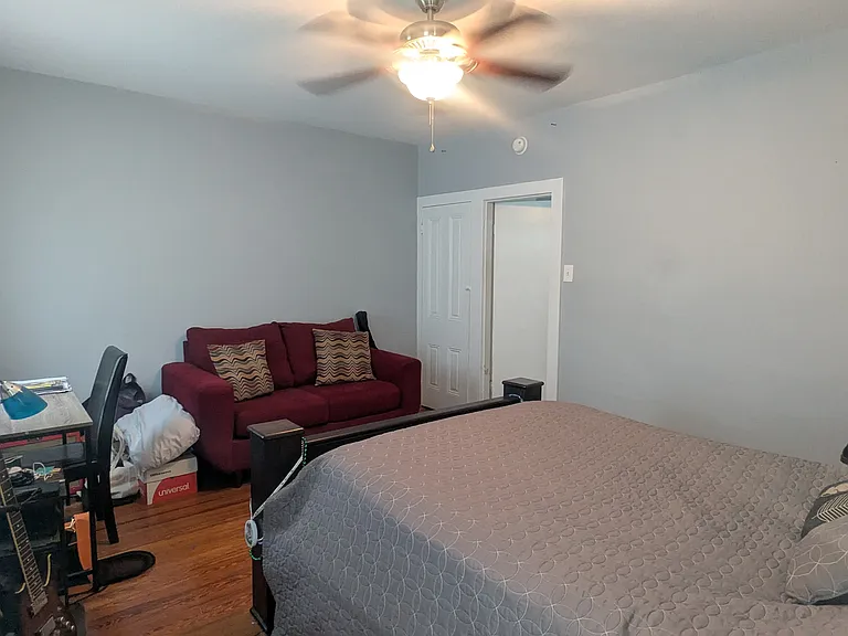 2nd floor bedroom has north facing windows and views of the church (which is now condos)