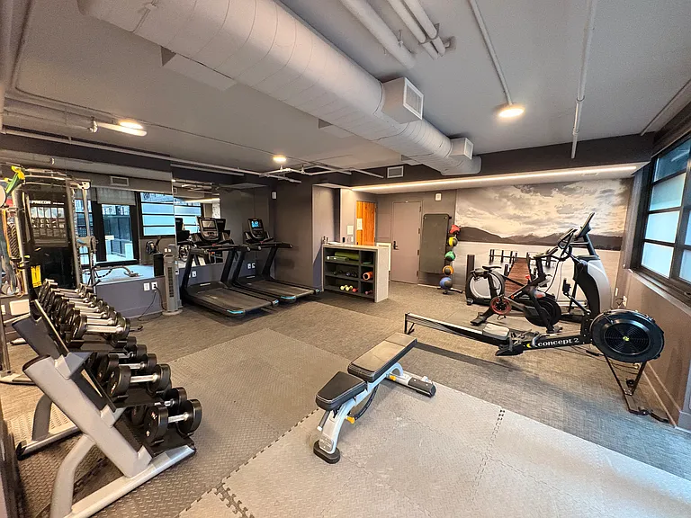Beautiful gym on same floor as condo, complete with Peloton Bike, 2 treadmills, elliptical, rowing machine, weights and an outdoor patio for stretching, pilates and yoga.