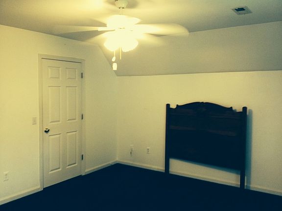 Upstairs Bedroom
						:
						Plenty of room and a full walk-in closet. Headboard is from a queen bed.