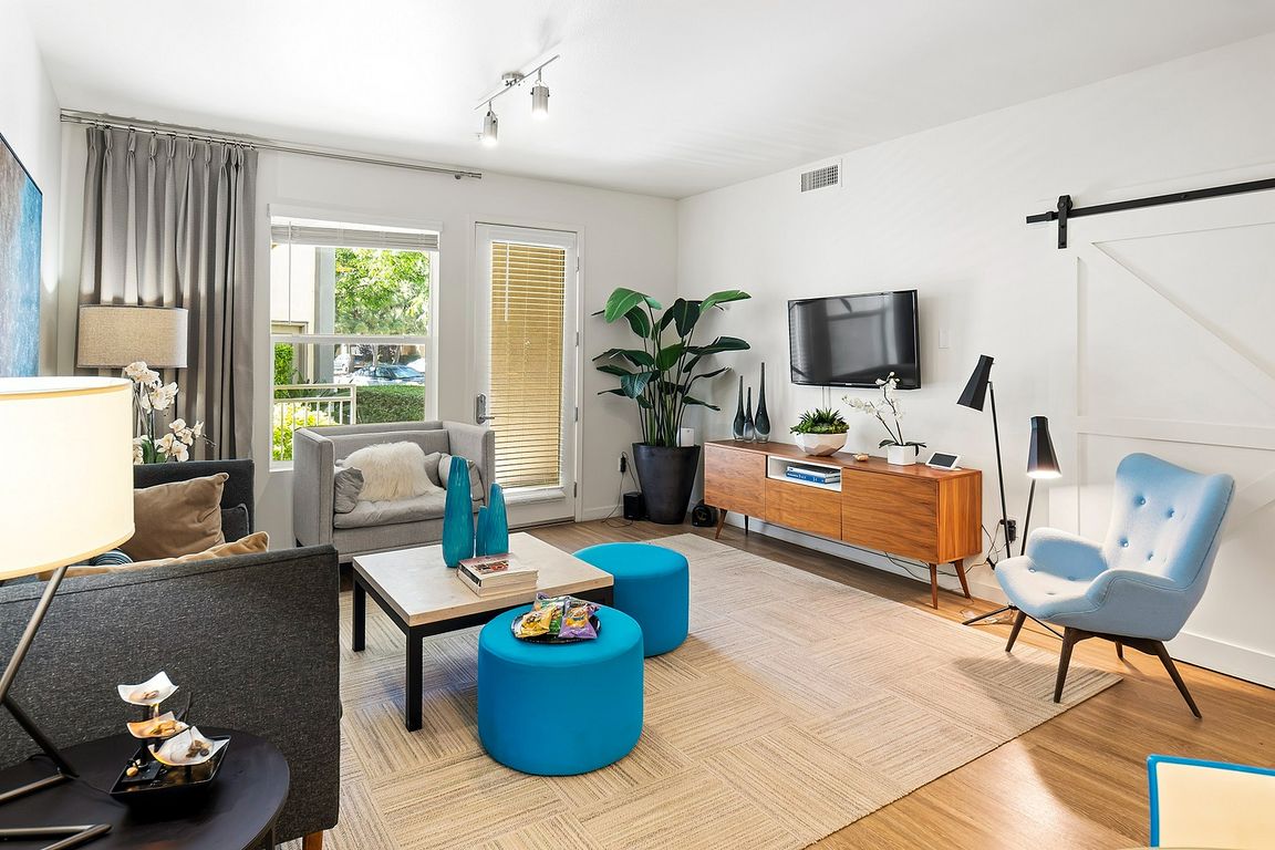 Bright and stylish living room in Tempo at Riverpark