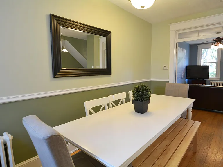 Dining area looking into living room.
