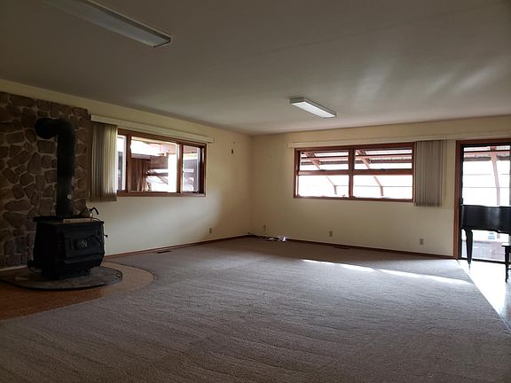 Living area open to the kitchen and sunroom