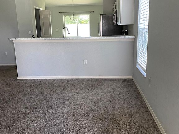 Large living space that opens to the kitchen