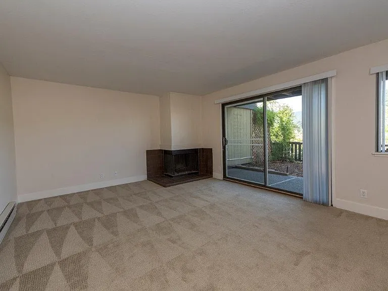 Parkside Apartments empty living room and patio
