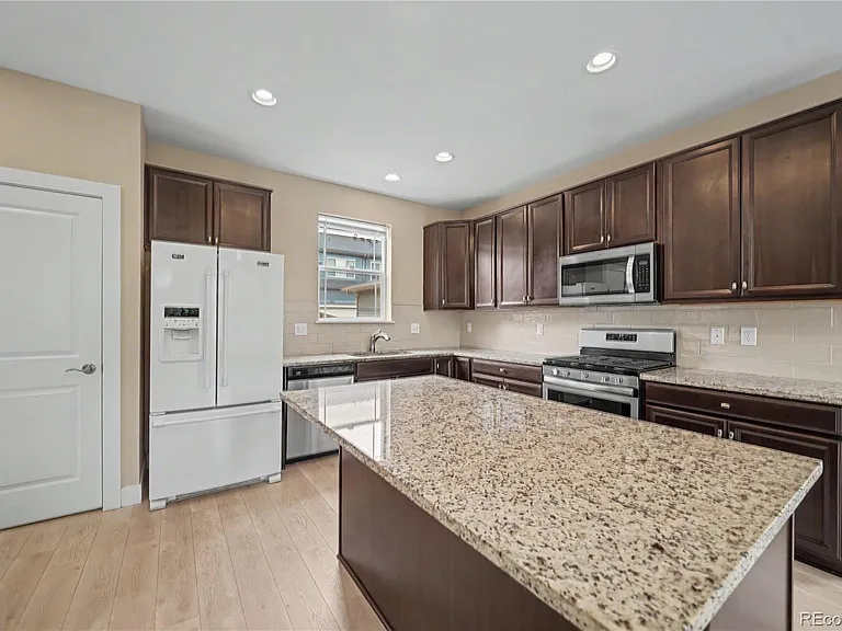 4937 S Addison Way — Photo 3