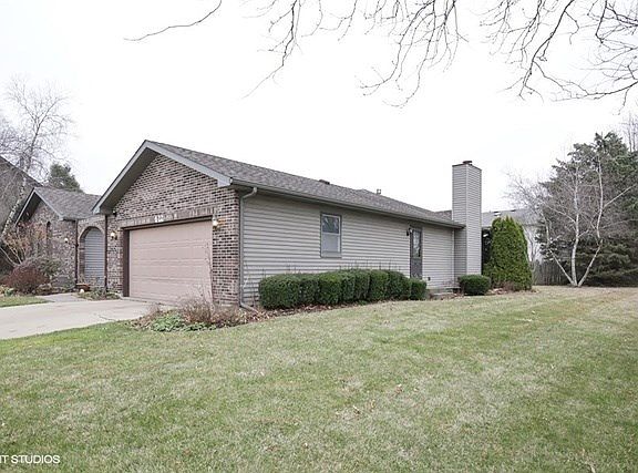 Settled on a corner lot with mature landscaping!