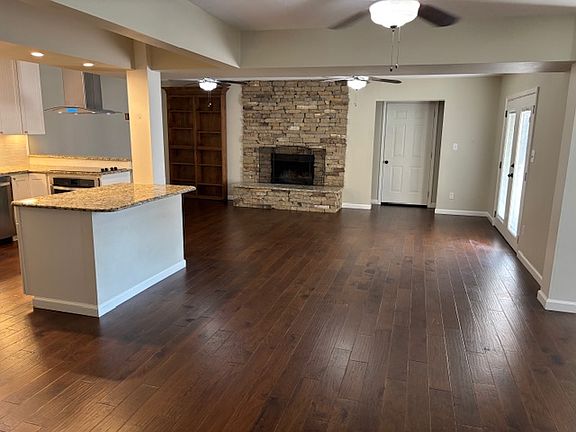 2nd living area with awesome wood burning fireplace.