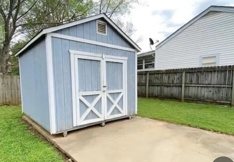 SHED IN BACK YARD