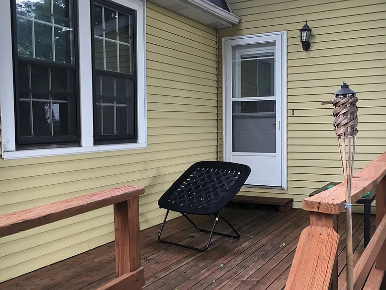 Deck behind house