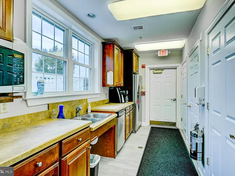 100 Middlesex Blvd #211 — Photo 41