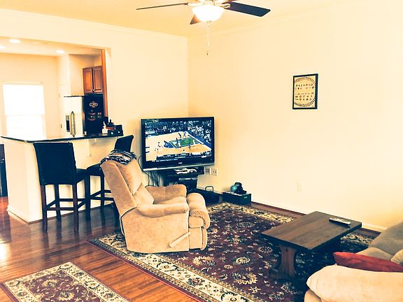 Family room is wired for surround sound speakers.