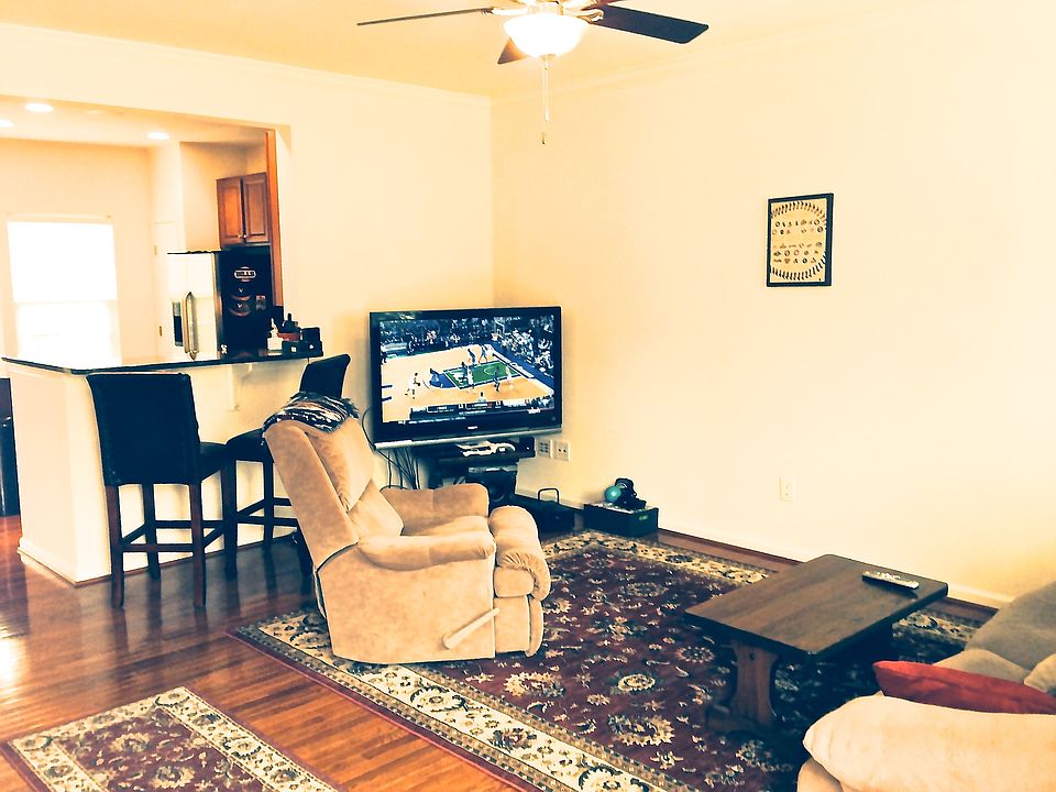 Family room is wired for surround sound speakers.
