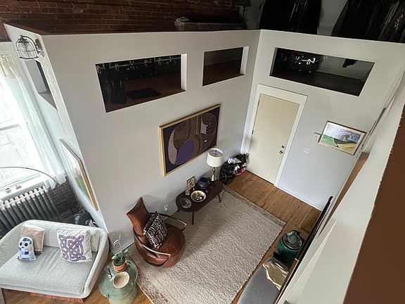 View of the second floor entry from loft above
