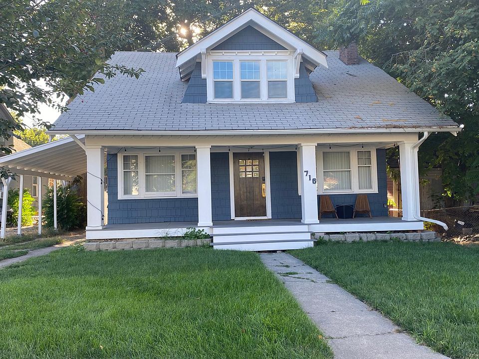 Front of home. Unit enters from left side, up stairs