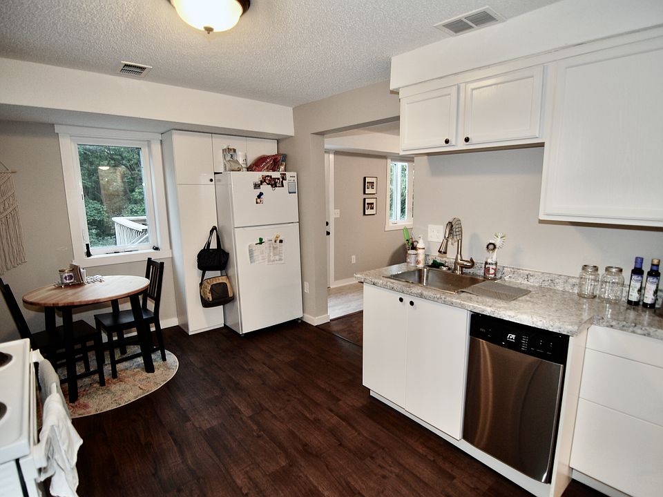 IKEA lower cabinetry and surrounding refrigerator.