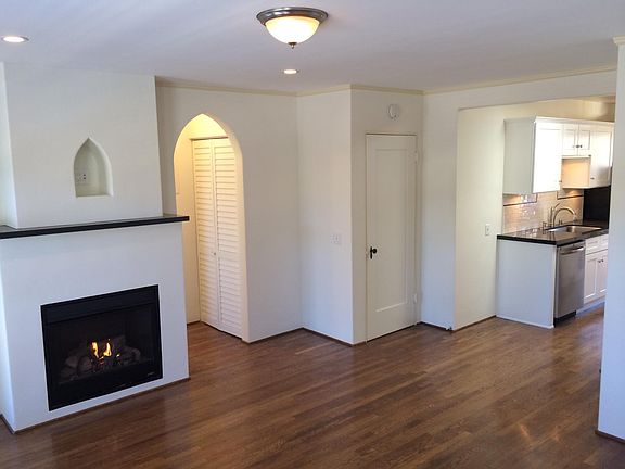 Studio living area with gas fireplace. 