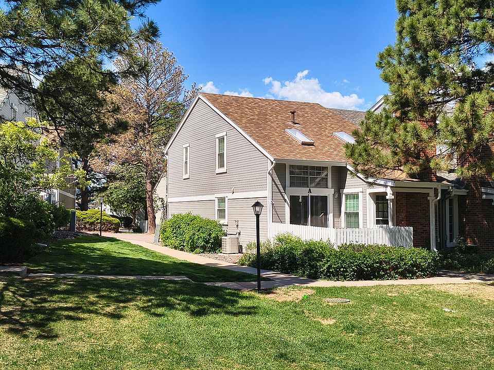 Front of property, faces open space and park leading to tennis courts and pools