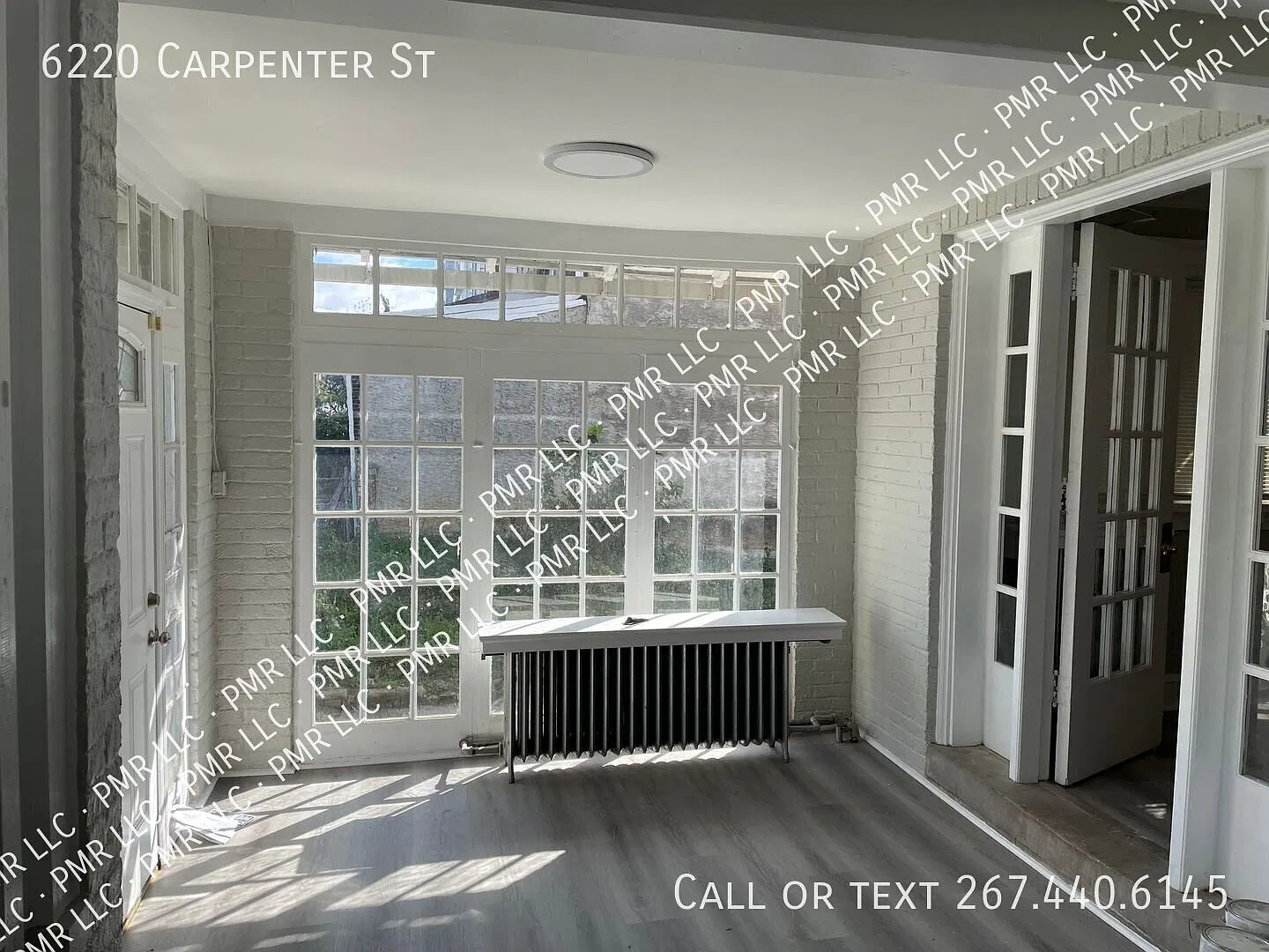 Spacious 5-Bedroom Cobbs Creek Townhome with Garage and Driveway — Photo 3
