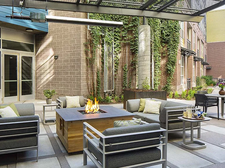 Apartment community outdoor fire pit at Griffis Union Station in Denver, Colorado.