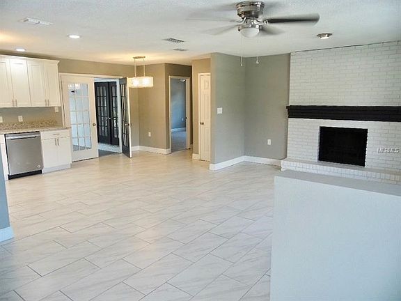 Living room opens up to kitchen area