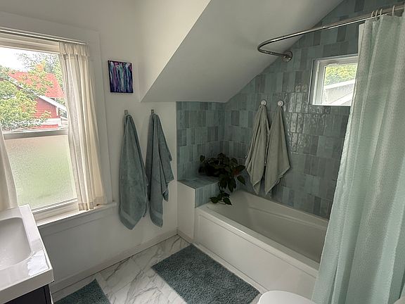 Remodeled bathroom, extra long tub