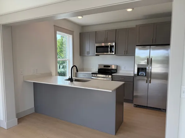 NOW LEASING!! Stunning New Construction in the Heart of Downtown Springdale!