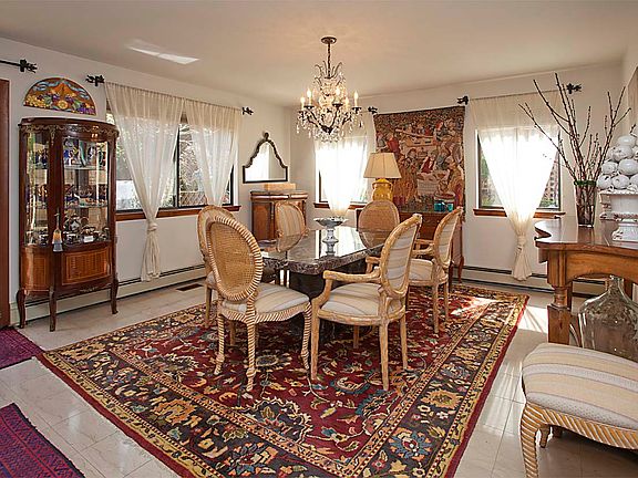 Dining Room with doors out to decked patio & yard