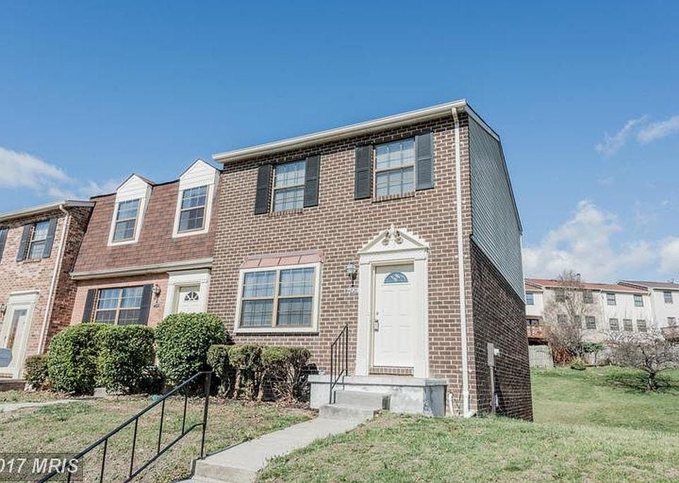 Beautiful brick exterior; end of unit town house with large back yard