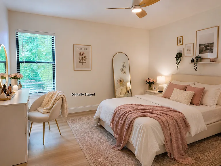 Second bedroom with walk in closet and direct access to a bathroom. Digitally Staged