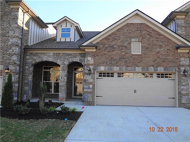 Beautiful brick and stone townhomes of Rockbridge Cove. Small neighborhood when we are finished.