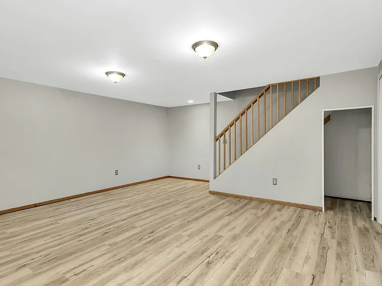 Spacious lower level offering flexible living or entertainment space