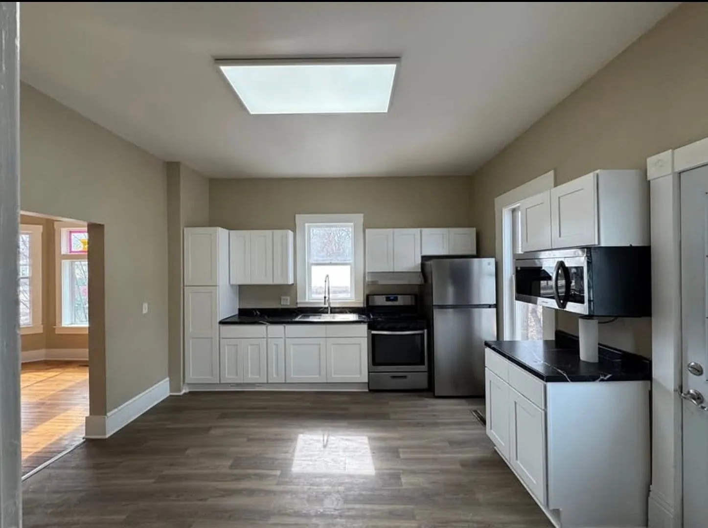 Newly Updated 5-Bedroom, 2-Bath Home Spacious, Modern & Move-In Ready! — Photo 2