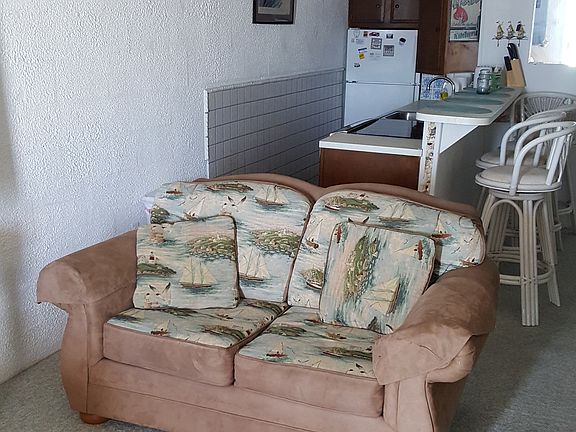 living room/view of kitchen