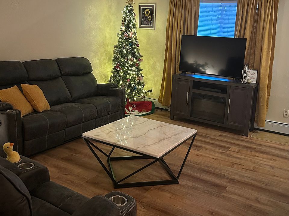 Living Room on Main Floor. A variety of possible furniture layouts.