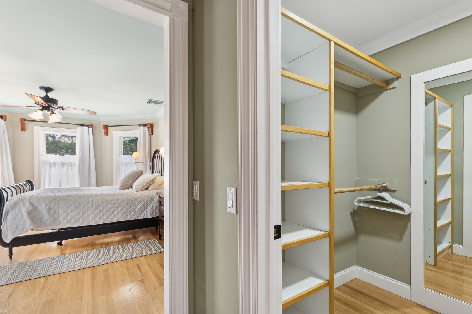  Walk-In Closet in Primary Bedroom. Closet is Between the Bath and Bedroom
