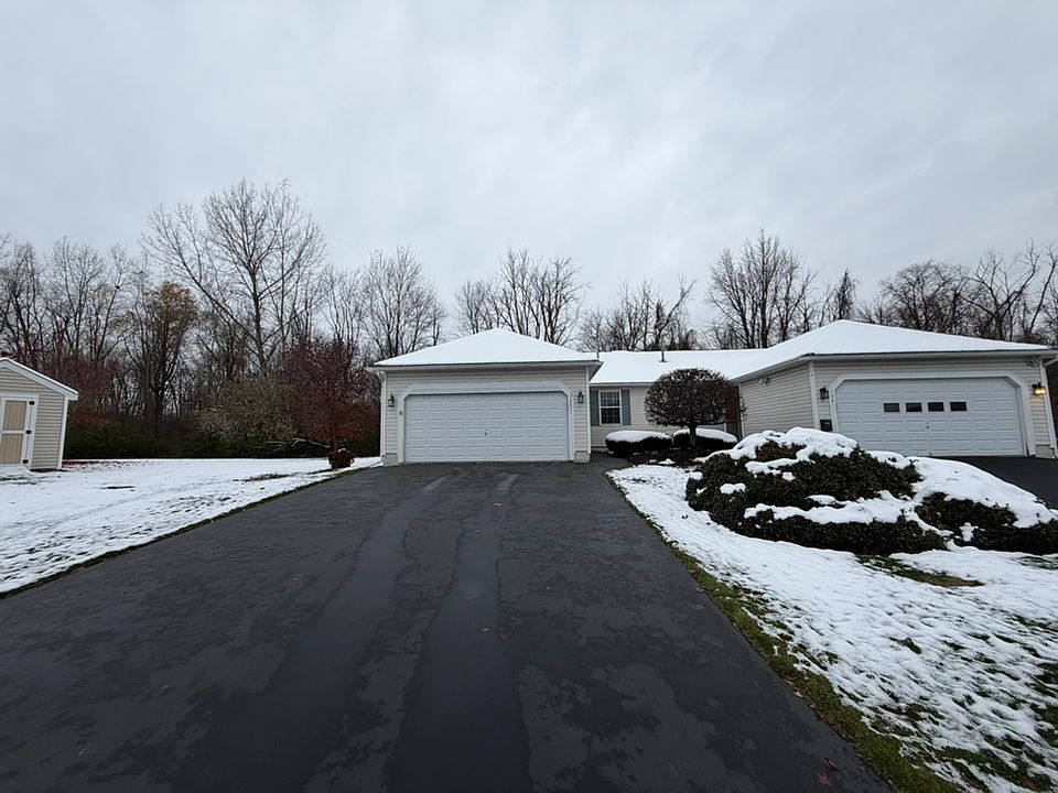 private driveway, 2 car garage, in the summer screened in garage