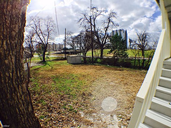 The house features a large backyard, a rarity this close to