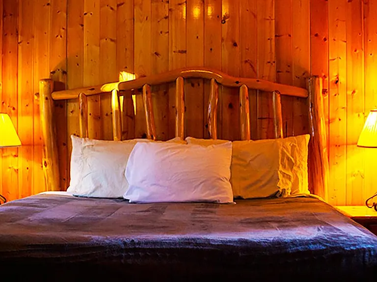 2nd bedroom with king bed, large dresser, views, hallway full bathroom.