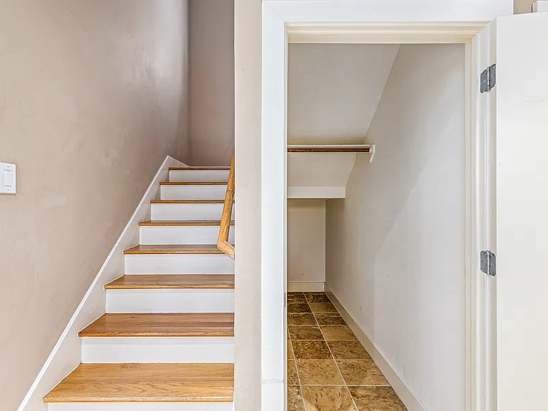 Spacious under the stairs closet