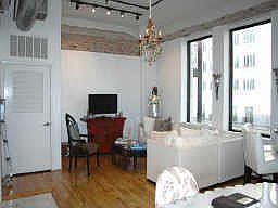 Sun filled living area offers large picture windows allow views over the movem