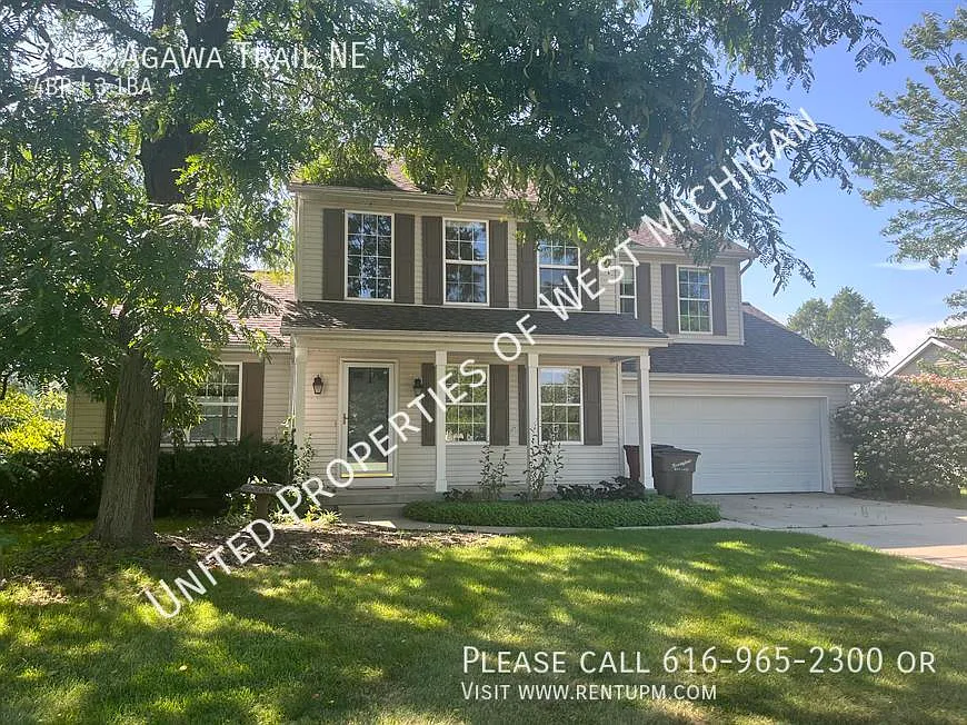 Available Now | 4 Bedroom 3.5 Bath Single Family Home in Rockford | Kitchen Island With Wine Rack... — Photo 2