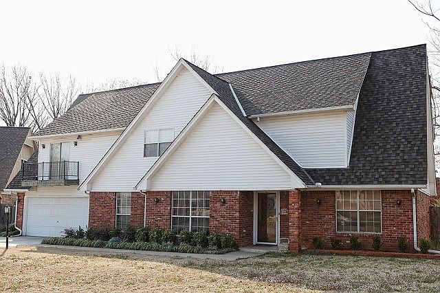 Large brick home in well established neighborhood