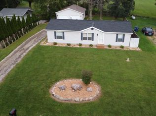 1088 Duquesa Dr, Weidman, MI 48893