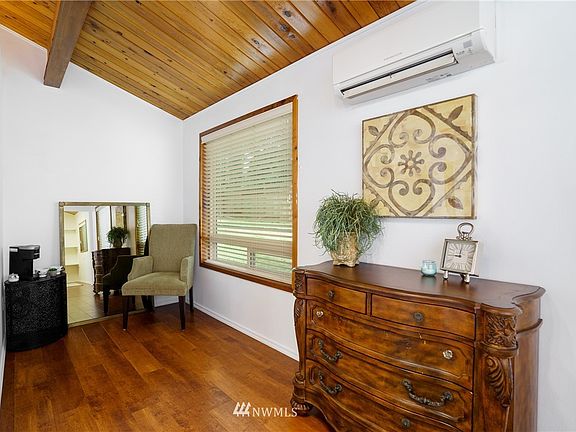 Sitting area in master bedroom. Heat and airconditioning with HP mini split for comfort sleeping year round.