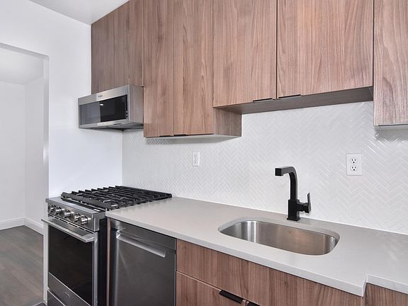 Another view of the renovated kitchen out towards the dining alcove.