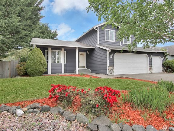 Beautifully landscaped on a shy 1/4 acre lot.