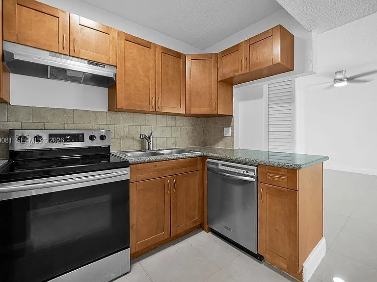 6953 SW 7th St — Photo 12