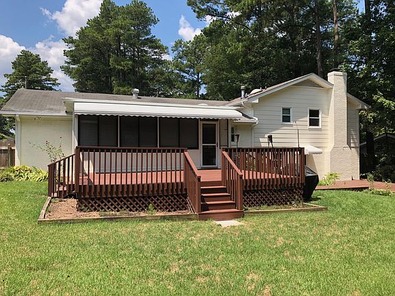 Two backyard entertaining areas with upper and lower level decks.
